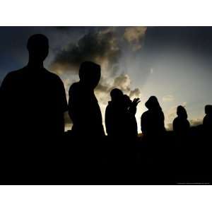 Immigrants Chat at Sunset Outside of the Holding Centre for Immigrants 