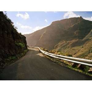  View Down a Highway Going Through Luminous Mountains in La 