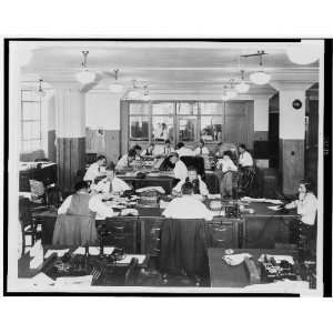  Men working in the newsroom of The World Telegram 