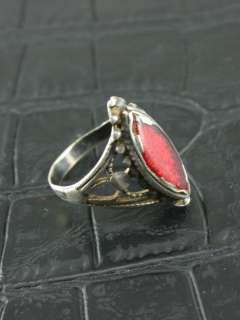 Ring measures approximately 0.9 inches ( 2.2 cm) high.
