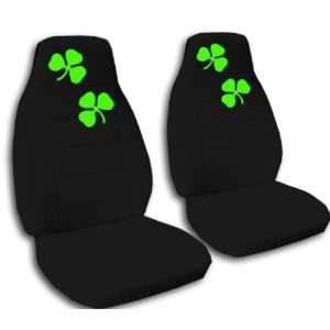  2 black car seat covers with lucky shamrocks for a 2001 