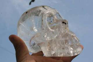 Clear Quartz Rock Crystal Skull Carving black substance  