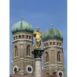  Statue in the Marienplatz and Towers of the Frauenkirche in Munich 