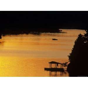  Scenic View of Boat on a Lake a Sunset Premium 