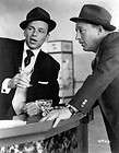 Frank Sinatra holding martini at bar with Bing Crosby High Society 