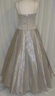   ball gown the color is silver the dress is made from satin bodice
