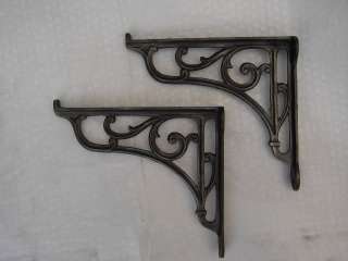   original antique cast iron brackets for your cistern or shelf