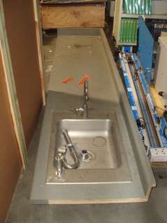 Laminate Counter Top and Stainless Steel Sink  