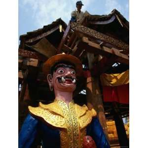  Buddhist Monastery Statue and Worker at Xishuangbanna 