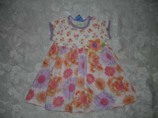 Here we have such a pretty little girls Baby Lulu floral dress. It is 