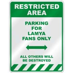   PARKING FOR LAMYA FANS ONLY  PARKING SIGN