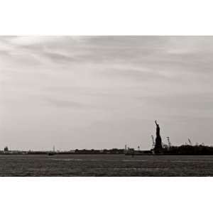  Lady Liberty Watches Over NYCs Industrial Harbor 