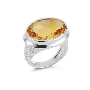   and Etched Ring, Centered With An Oval Shaped Citrine Color Stone
