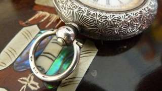   porcelain dial with roman chapters original hands plastic glass