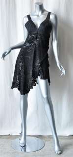   this laser cut suede dress has a ragged asymmetrical hem and a