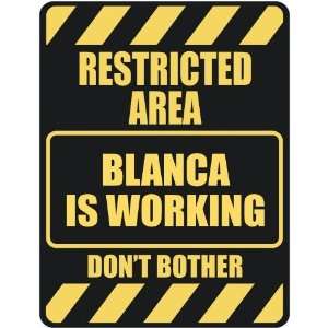   RESTRICTED AREA BLANCA IS WORKING  PARKING SIGN