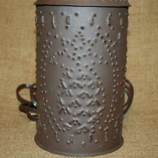 This Paul Revere style punched tin tart warmer is 10 inches tall by 4 