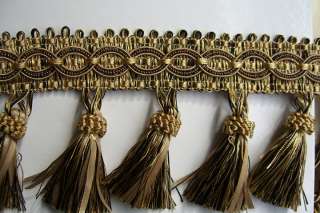   DESIGN of Tassel Trim that has a embroidered design at the top