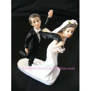  Humorous Cake Topper   Bride pulling Groom by his Tie 