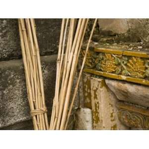 Brooms Rest against Ancient Wall of Chinese Mausoleum, China Premium 