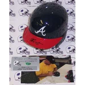  Chipper Jones   Riddell   Autographed Batting Mini Helmet 