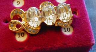 JOAN RIVERS 2000 GOLD TONE AND CLEAR CRYSTAL PIN  