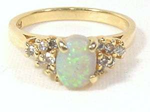 Opal Cocktail Ring Cabochon cut Solitaire with diamond cluster accents 