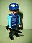 playmobil police officer in baseball cap with baton location united 