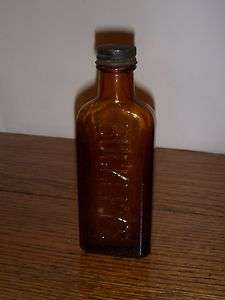 VINTAGE BUCKLEYS BROWN COUGH SYRUP BOTTLE with CAP circa 1950s 